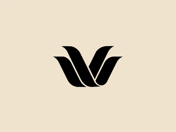 The Wacoal logo features a stylized letter "W" in bold, black color, showcasing a minimalistic and modern design. The sharp angles and sweeping curves suggest fluidity and motion, while the negative space in the middle creates an intriguing visual gap. The bold and simple black color would stand out against a lighter background.