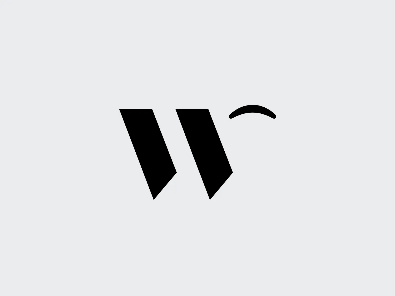 The Wink Condoms logo is a simplistic and modern design composed of three black shapes. Two tall, parallelogram-like figures are placed side by side, slightly tilted inwards, creating a sense of opening or pages of a book. The third shape is a small, curved line above and to the right of the parallelograms, giving the impression of motion or a flying object. The logo's minimalist design uses solid black without any gradients or additional colors, and the use of negative space between the elements adds a sophisticated touch to the overall aesthetic.