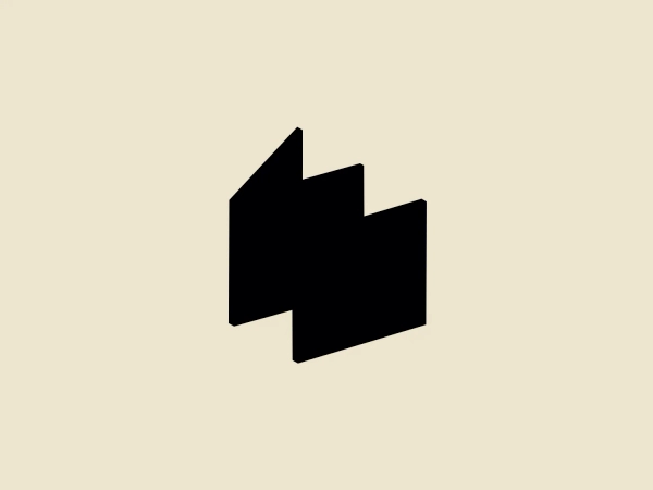 The National Women's History Museum logo features bold, black geometric shapes that create an abstract design. Two overlapping irregular quadrilateral shapes form the logo, with the upper shape resembling a skewed 'L' or an arrow pointing upwards and to the right, and the lower shape resembling a skewed 'U' or a bracket. This modern and bold logo creates a simple yet dynamic visual, suggesting movement or a transformative process through the interaction of the shapes.