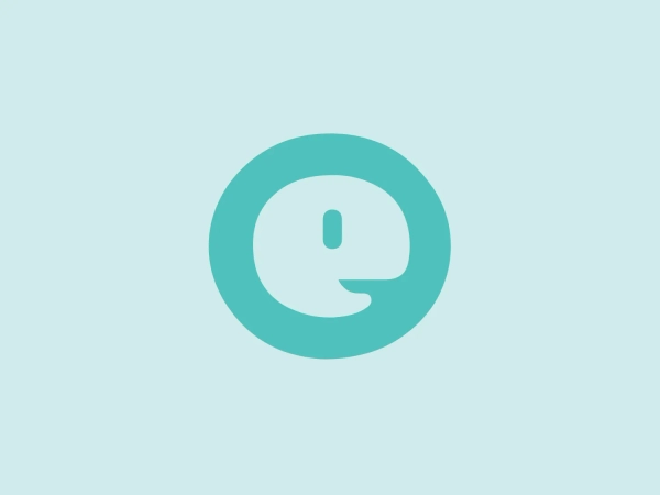 The Extensis logo features a stylized lowercase 'e' enclosed within a circle. The 'e' has a contemporary, minimalist aesthetic with no horizontal line, implying its shape rather than defining it explicitly. The logo uses a fresh and calming shade of teal, giving it a modern and clean appearance. The roundness of the enclosing circle complements the curvilinear form of the 'e,' resulting in a harmonious and balanced design. An interesting feature is the use of negative space; the center of the 'e' is hollow, following the circular theme and contributing to the logo's simplicity.