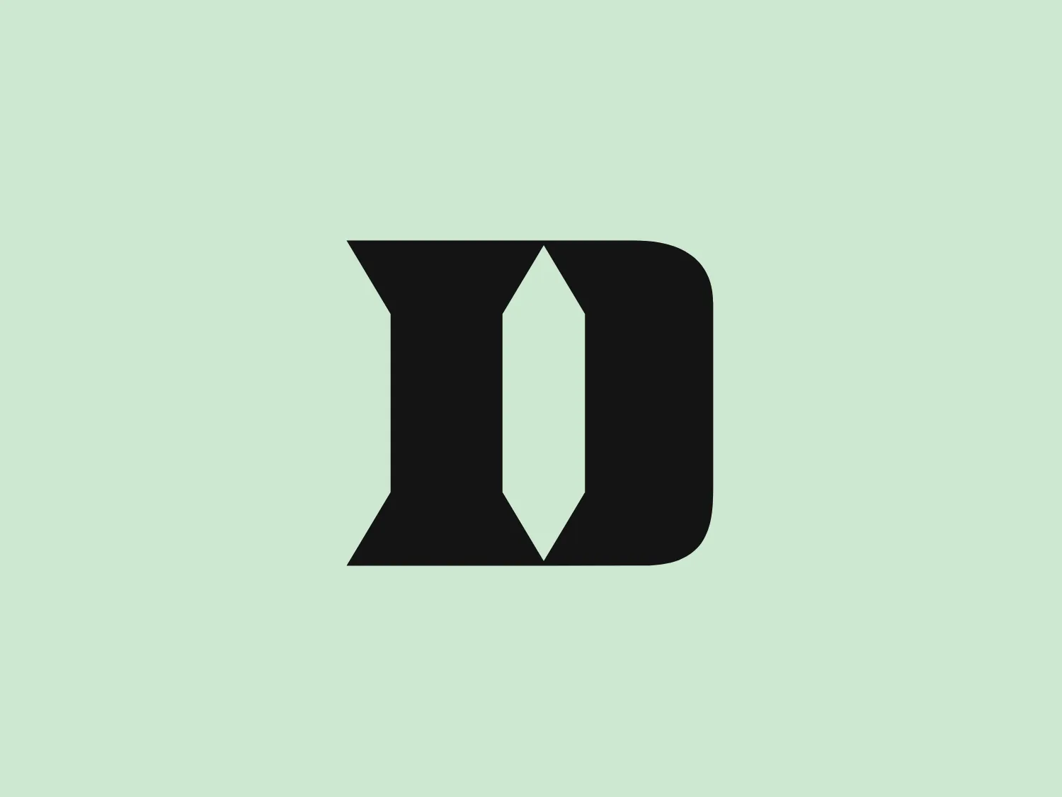 The Duke Blue Devils logo features bold, geometric shapes in a deep blue color, creating a modern and minimalist aesthetic. The design is symmetric, with sharp angles and smooth lines, exuding balance and stability. The white spaces within the design form an implied shape, adding to the overall identity of the logo.
