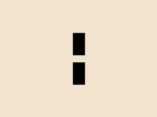 The Industri logo displays a minimalistic design featuring two vertical black rectangles of identical shape and size, separated by a gap. The clean lines and simplistic approach create a sense of balance and uniformity, giving the logo a contemporary and versatile aesthetic. With sharp corners and a solid fill, the rectangles stand out against a lighter background, presenting an abstract and professional appearance that can be representative of various industries or concepts such as architectural strength, equality, or a pause symbol.