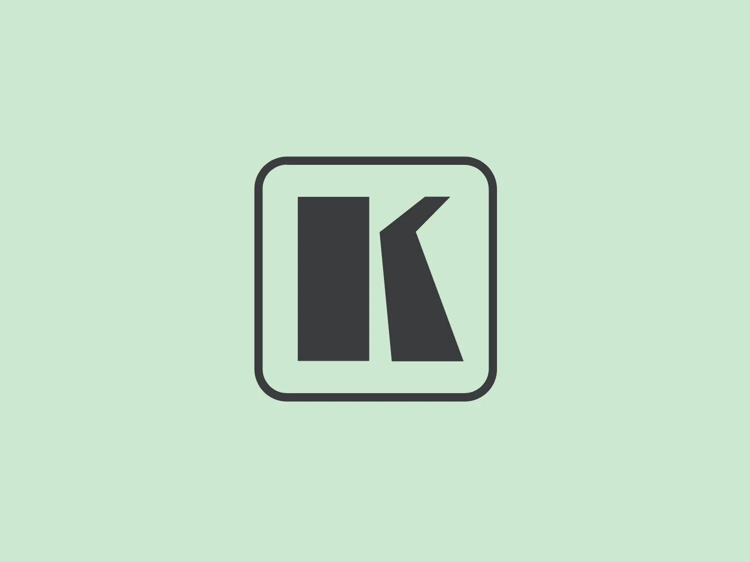 The Kramer Electronics logo features a bold sans-serif "I" followed by a unique "K," creating a distinct angle that points upwards or to the right. The letters are presented in solid black within a square border, adding a minimalist and modern look with strong geometrical lines.