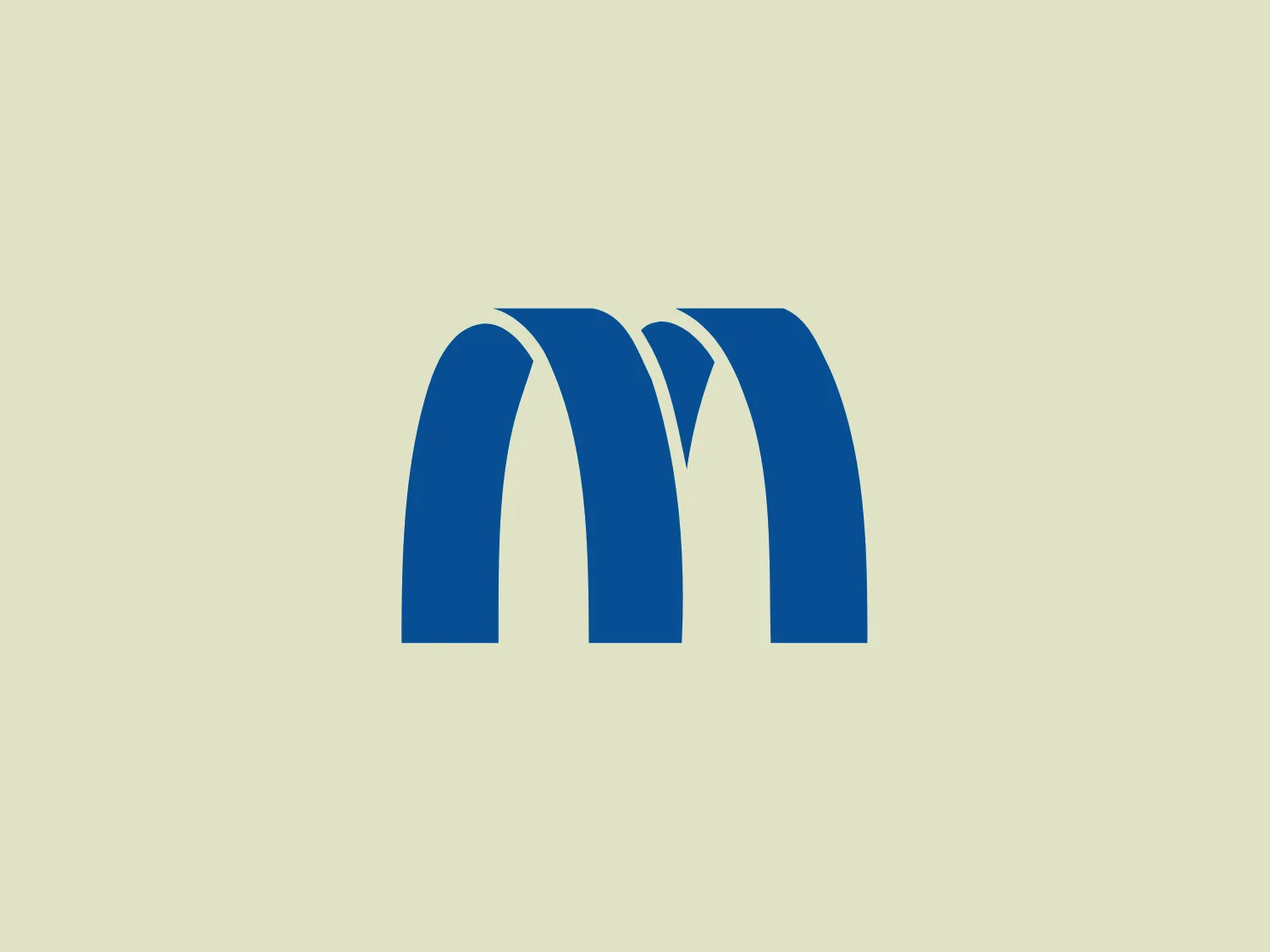 The logo in the image consists of a stylized letter "M" with rounded peaks, resembling a series of arches or waves. The design is modern and minimalistic, using a solid, bold blue color on a plain background. The lines are smooth, with no embellishments or additional elements, emphasizing a clean and contemporary look. The blue color is vibrant and eye-catching, suggesting a sense of reliability and professionalism for Merkel.