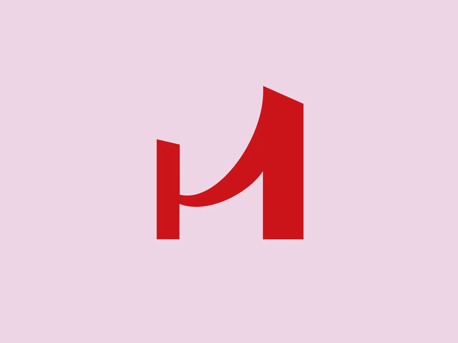The Hanmi Bank logo depicts a stylized letter "n" with a modern, geometric design. It features sharp angles and a mix of curves, with the right-hand side curving outward and then cutting sharply back in to create a distinctive, angular loop. The logo is rendered in a solid, vibrant red with a matte finish that exhibits neither shine nor shadow, giving it a flat, two-dimensional appearance. This bold and minimalist design gives off a strong and contemporary vibe that would suit a variety of branding and identity projects.