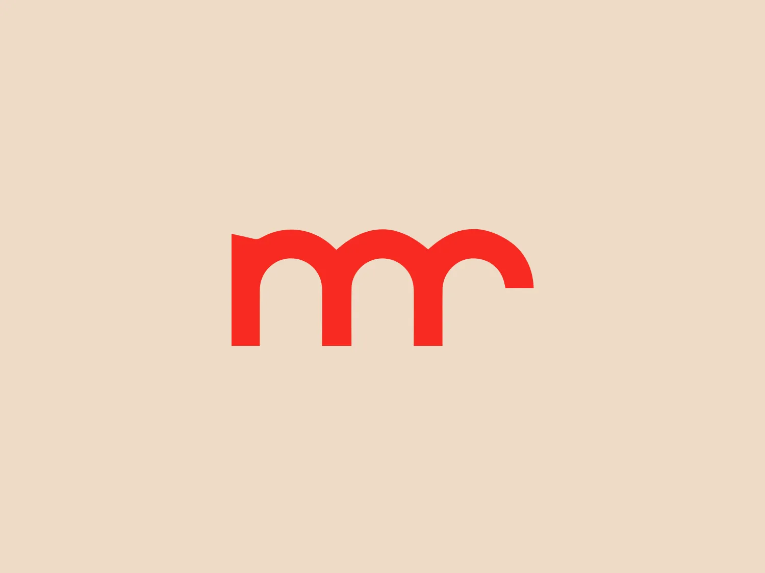 The Ville de Romans logo features a minimalist and modern design comprising two lowercase 'm' letters placed adjacent to each other, sharing a common vertical stroke in the middle. The 'm's exhibit smooth curves and the overall shape resembles a waveform or perhaps a visual pun on the concept of symmetry and connection. Executed in a bold and solid red color, the graphic is striking yet simple, with no additional embellishments. The design is versatile and easy to recognize, likely intended for clear brand identification. A soft, neutral background that complements yet contrasts the vibrancy of the red would be best for this logo.