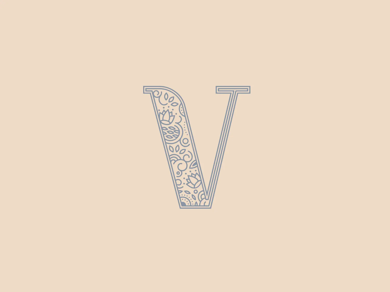 The De Heeren van Vroondaal logo showcases a stylized capital letter "V" with intricate floral and leaf patterns inside, creating a delicate and organic feel. The thin and precise lines in the patterns convey elegance and attention to detail. The overall appearance is harmonious and sophisticated, presented entirely in a soft, monochromatic shade of blue-grey, lending the logo a refined and serene quality. A warmer background color could complement the intricate design and cool tone of the logo nicely.