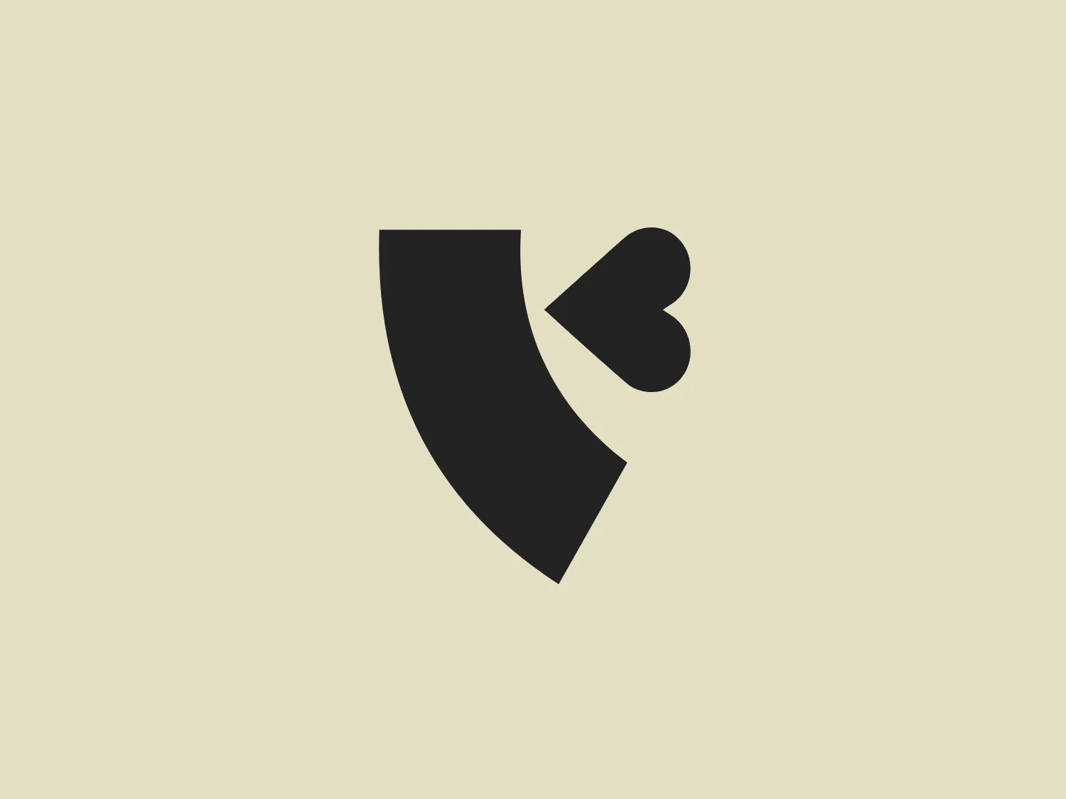 The Love Wellness logo is a stylized shield shape in bold red, with a distinctive heart crafted into the right side, symbolizing protection and love or care. The heart shape is created using a negative space effect, while the modern and minimalist design relies on solid color to convey its message.