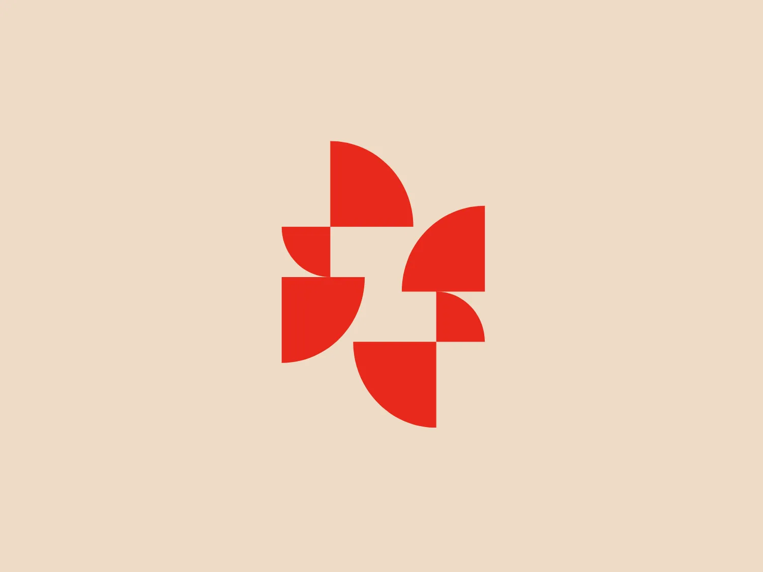 The Zovio logo is a geometric design featuring four curved shapes that intersect to create a pinwheel-like emblem. Each shape is a vibrant red-orange quarter-circle, arranged to convey dynamic, rotating movement. The evenly spaced shapes form a cross in the negative space at the center, highlighting the design's symmetry and balance. This bold, simple design conveys energy and motion, amplified by the contrast of empty space. The vivid red-orange color would be complemented by a neutral and light background.