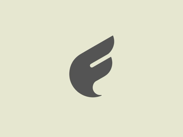 The Flight JS logo is a stylized, abstract design that resembles a flame or a drop, with a dynamic and fluid appearance. It is composed of two main elements that curve to the right, creating a sense of motion. The upper part is larger and resembles the shape of a flickering flame or a water drop in its design, which is complemented by a smaller, similar shape below it, suggesting a reflection or shadow. Both shapes share the same bright, solid blue color, which gives the logo a vibrant and energetic feel. The simplicity of the design contributes to its modern and minimalistic aesthetic.