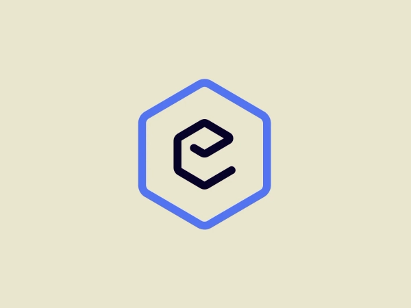 The EPOM logo features a stylized letter "C" in a sophisticated, minimalistic font, situated inside a double-lined hexagon. The letter itself is dark blue, creating a strong contrast against the white background within the hexagon. The outer line of the hexagon is a lighter shade of blue, while the inner line is darker, matching the "C". The combination of geometric shapes and the contrast between the blues gives the logo a modern and sleek appearance. This design would pair well with a subtle background to maintain its clean and professional look.