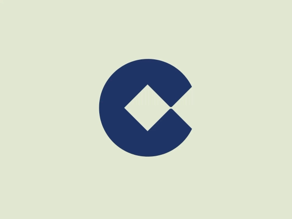 The Cope logo features a circular shape divided by a clear diagonal line, creating two distinct halves. Within the negative space formed by the division, an angular, arrow-like figure points to the right, implying movement or progression. The design utilizes a solid, dark blue color, evoking professionalism and dependability. Its clean, minimalist, and modern aesthetic, with no extra embellishments, emphasizes the sharp geometry of the design. The simplicity of the logo makes it versatile and easily identifiable.
