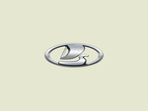 The Lada logo showcases a stylized, abstract shape inside an oval. The design utilizes gradients of silver and chrome, creating a sleek metallic appearance with hints of reflection, imbuing a sense of luxury and technology. The smooth curves and flowing lines of the abstract shape convey motion and modernity, encapsulated by the oval frame for a professional finish. Despite a monochromatic palette, the interplay of light and shadow adds depth and dimension to the emblem.