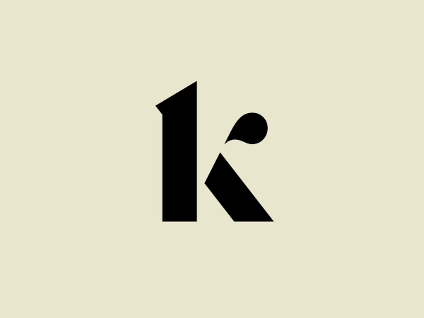 What we like: The sleek black logo with geometric shapes creating an abstract "K" exudes modernity and professionalism.