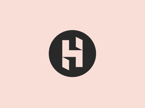 We like the bold and modern design of the Hong Kong Housing Society's logo, with its strong contrast and striking visual impact.