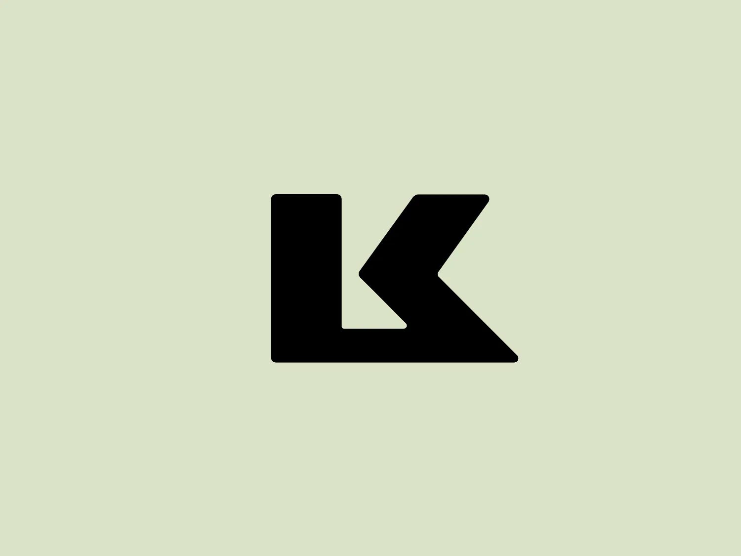 The image displays a bold, abstract logo consisting of two geometric shapes that resemble a stylized letter "K." The logo is black and features a right angle that forms the vertical line of the "K" while an obtuse triangle with its point cut off constitutes the oblique lines. The overall design aesthetic is minimalist and modern, with sharp angles and a strong, clear silhouette that conveys a sense of dynamism and precision for Kriega.