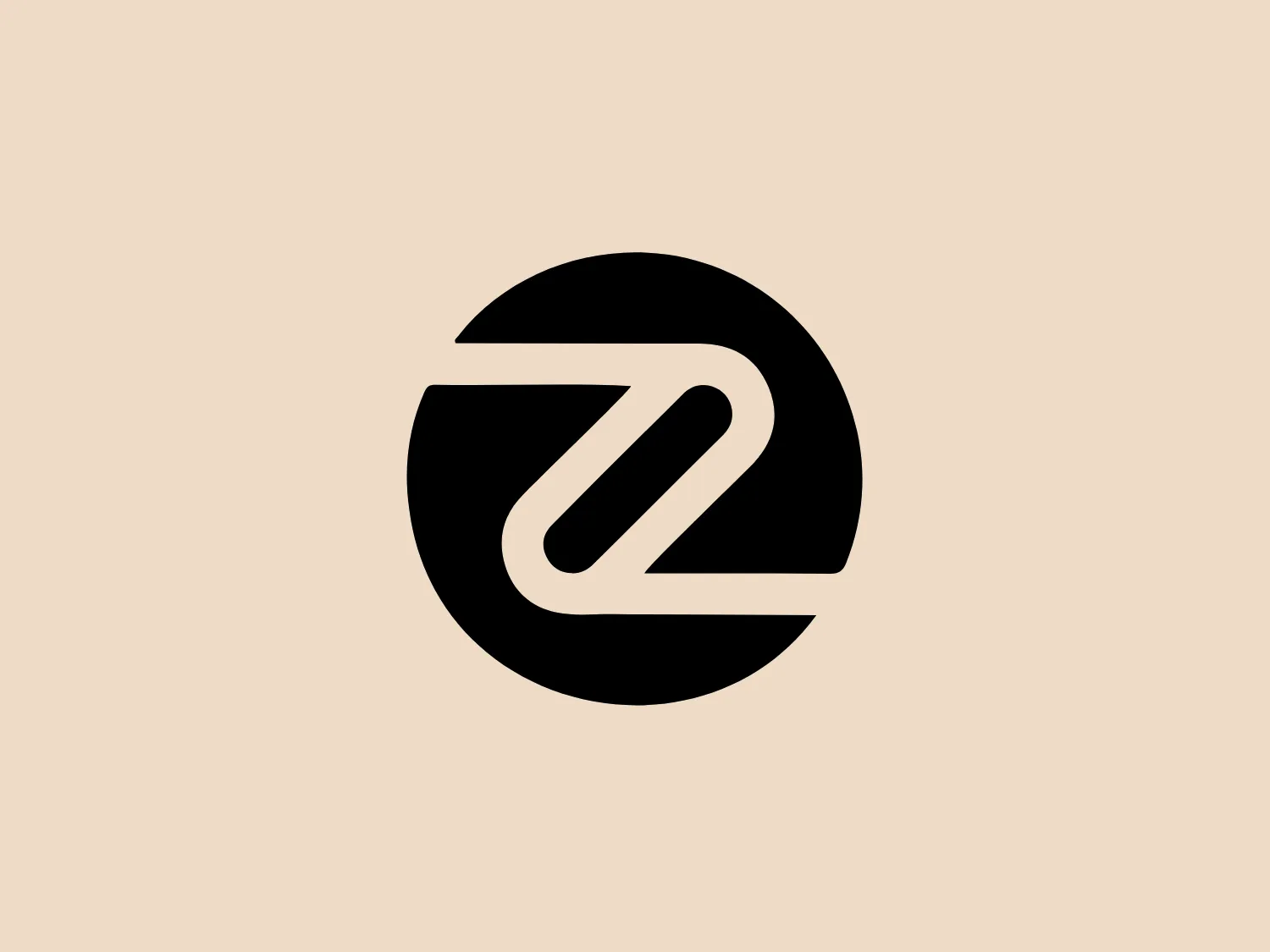 The Zero Lifestyle logo features a stylized, abstract letter "Z" in a bold, sans-serif typeface, positioned centrally within a circular shape. The design is monochromatic, with the "Z" and the outline of the circle in black against a white background. The "Z" is constructed with a combination of curves and sharp angles, giving it a dynamic and modern feel. The overall design is minimalist and could be seen as reflecting a sense of simplicity and sophistication. The thick lines of the "Z" emphasize strength and stability within the enclosing circle, which suggests completeness or a global presence.