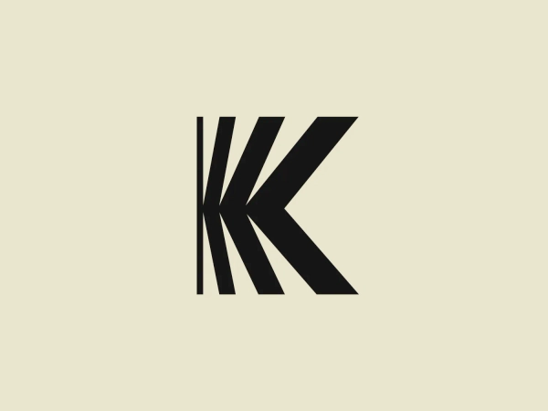 We like the symmetrical and dynamic 'K' logo design, with sharp angles and a sophisticated deep purple color.