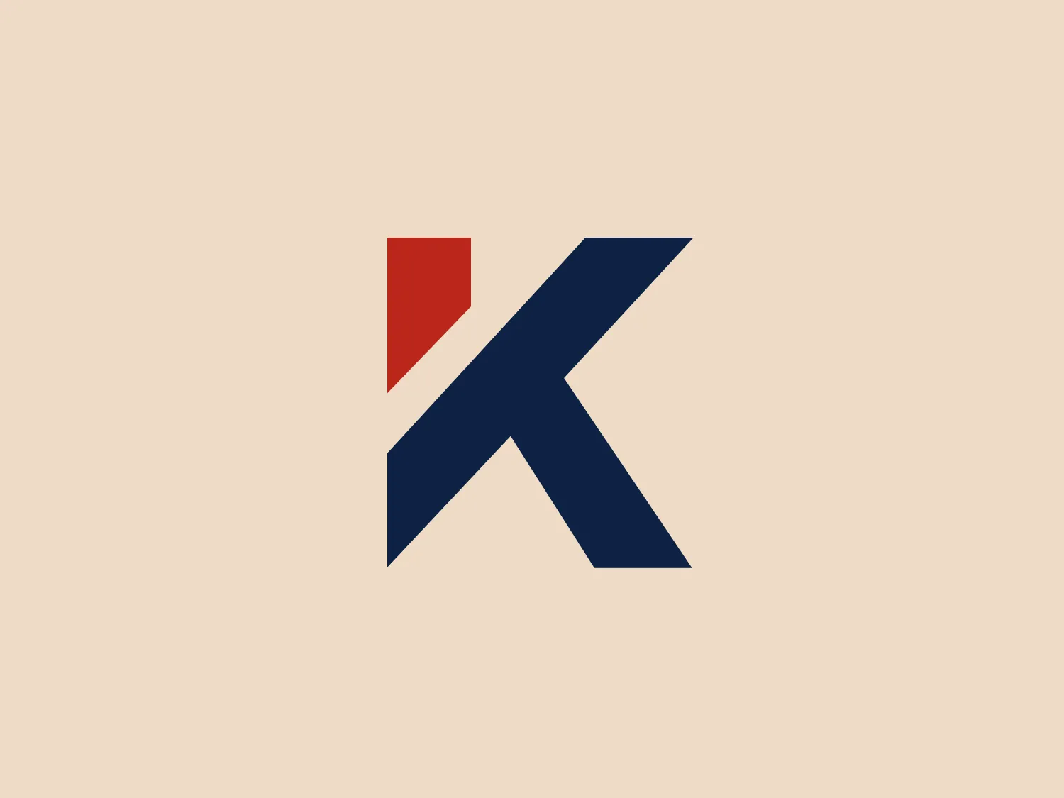 The Kemper logo emphasizes a bold, navy blue "K" with sharp angles, connoting strength and stability. The design also incorporates a smaller, triangular red shape on the upper left side, adding a punch of energy and attention to the logo. The contrast between the red and navy blue gives the logo an assertive and professional appearance.