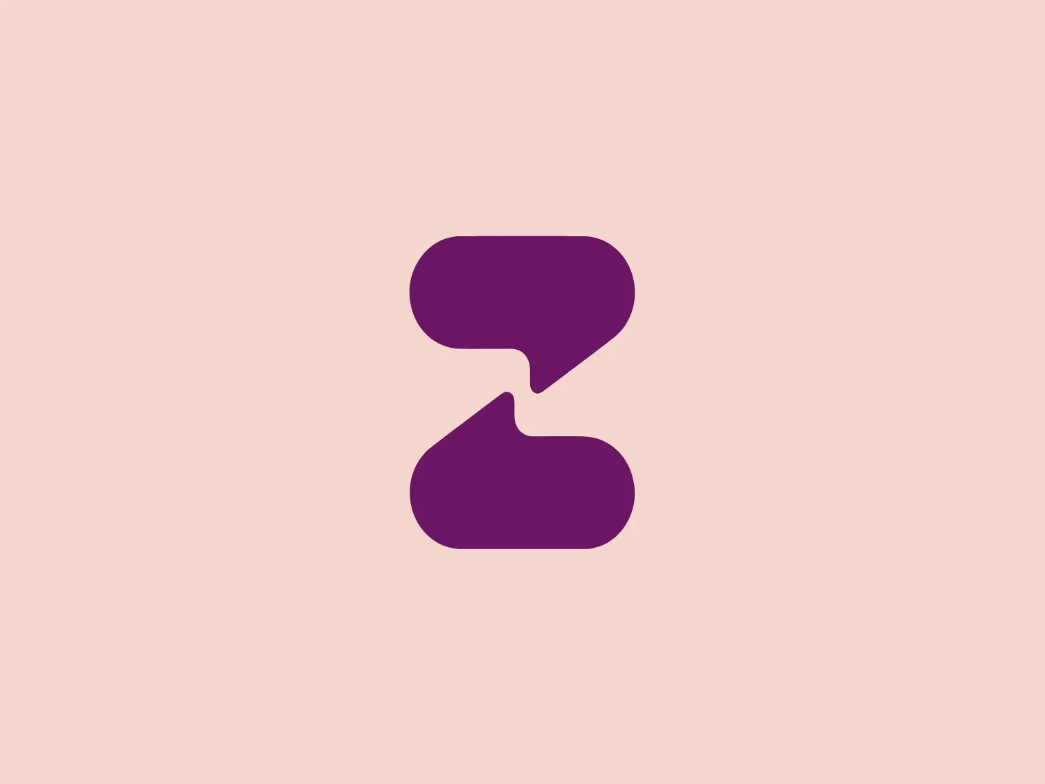 The Zula logo features two abstract shapes resembling speech or thought bubbles stacked with their points aligned. The upper, smaller shape is oriented horizontally, while the larger one below it has a vertical orientation. Both shapes have a modern, rounded design in a solid, deep purple color, providing a sense of unity and strength. The edges of the shapes curve inwards, creating an organic and dynamic appearance. This minimalistic design conveys communication, connectivity, and interaction.