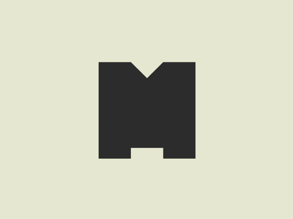 We like the bold, minimalist "M" with a distinctive notch, symbolizing strength and professionalism.