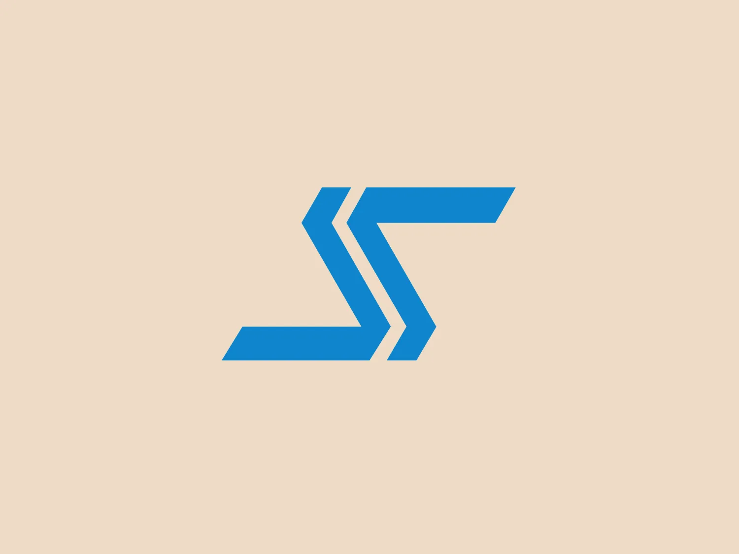 The logo features a dynamic, geometric design of the letter "S", composed of intersecting parallelogram shapes. The use of varying shades of blue, with darker and lighter tones, creates a sense of depth and contrast. This sleek and modern design suggests movement and progression while the clever use of negative space adds to its clean and professional appearance.