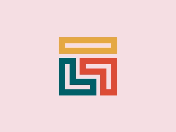 The Ginn Group logo showcases a stylized representation of geometric shapes that form a three-dimensional cube illusion. The design comprises three interlocking shapes in saturated tones: a mustard yellow bar at the top, a teal blue on the left side in an L-shape, and a coral red on the right in a backward L-shape. These shapes are arranged to create a sense of depth and dimensionality, playing with the viewer's perception. The overall aesthetic of the logo is modern and clean, with a minimalistic approach reminiscent of classic tangram puzzles or the Bauhaus design school.
