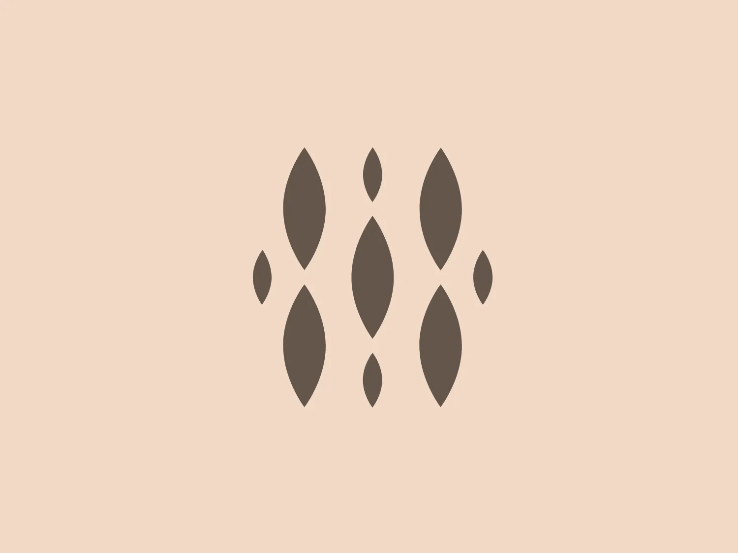 The Heritage Resorts logo features a symmetrical arrangement of abstract shapes that resemble stylized leaves or seeds, unified to create a harmonious and elegant pattern. It consists of a central row of three larger leaf-like figures, flanked by two smaller symmetrical elements on either side creating a sense of balance. The color palette is monochromatic, employing shades of muted dark brown that portray a sense of sophistication and earthiness. Each shape has a pointed top and bottom, rounded sides, and all are arranged in a way that forms a horizontal display. The overall design aesthetic is modern, clean, with a possibly organic or nature-inspired theme.