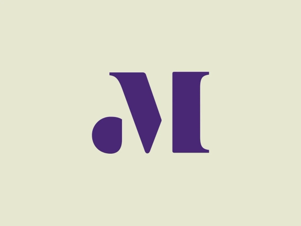 The logo featured for Mayo Performing Arts Center is a typographic representation consisting of two characters, possibly initials. The first character is a stylized lowercase ‘n’ with a right-angled vertex at the bottom, creating a sharp contrast to the otherwise curvaceous line that forms the letter. The second character resembles an uppercase ‘I’ with serifs at its base and top, but with unusually thick lines, giving it a bold presence. Both characters share a deep purple color, exuding luxury and professionalism. Embracing minimalism, the logo is distinguished by the simplicity and the balance between the roundness of the ‘n’ and the solidity of the ‘I,’ coming together to create a visually harmonious yet dynamic duality.