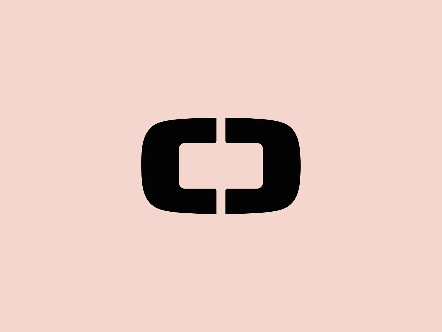The image depicts the OGIO logo with a bold, geometric design consisting of a stylized letter "C" that appears to be created from a continuous band, forming a nearly closed loop. The primary shape suggests a rectangle with rounded corners, with the central part of the "C" protruding inward, creating symmetry and balance. The OGIO logo is monochromatic, entirely filled with a solid black color, presenting a stark contrast and a modern, minimalist aesthetic. Its simplicity and use of negative space give it a highly recognizable and versatile appearance, suitable for various branding applications.