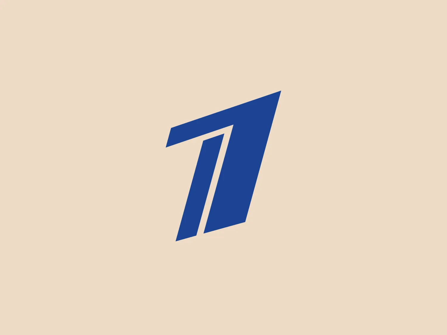 The image displays a stylized logo shaped as a number "7" with a modern and dynamic design. The logo consists of sharp angles and appears to be constructed from two distinct parallelogram-like shapes that create a sense of motion and forward momentum. The color of the logo is a deep blue, which conveys professionalism and trustworthiness. It is minimalist and would likely stand out well against a subtle background without much noise due to its bold form and strong color contrast.