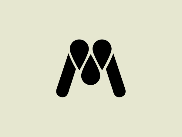 The La Mouche logo features a stylized letter 'M' composed of three geometric shapes resembling elongated teardrops or leaves, with the two outer shapes angled outward and the central one pointing downward, forming a symmetry around the vertical axis. The shapes are solid black with sharp points at the top and rounded bottoms, creating a dynamic and modern appearance. The black color provides a strong contrast, suggesting a sleek and professional brand identity.