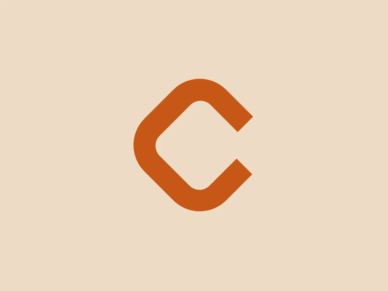 The Logo for Capsa 2in1 is a minimalist, modern design featuring a stylized letter "C". It has a bold, geometric shape with a seamless gap, creating a sense of openness within the design. The monochromatic color scheme uses a bright, warm orange, offering a vibrant and energetic feel while maintaining simplicity. The rounded edges of the letter give it a friendly and accessible appearance, contributing to its overall clean, contemporary, and easily recognizable aesthetic.