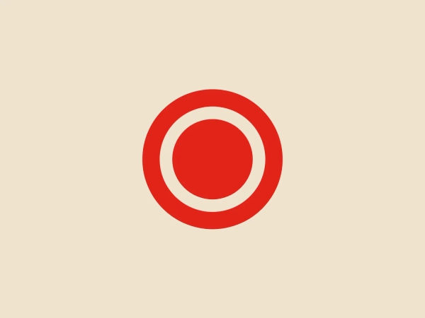 The rOtring logo features a bold and simplistic design with two concentric circles and a solid center. The primary color is a vivid red, creating a strong visual impact. The clean lines and minimalistic aesthetic evoke a sense of professionalism and efficiency.