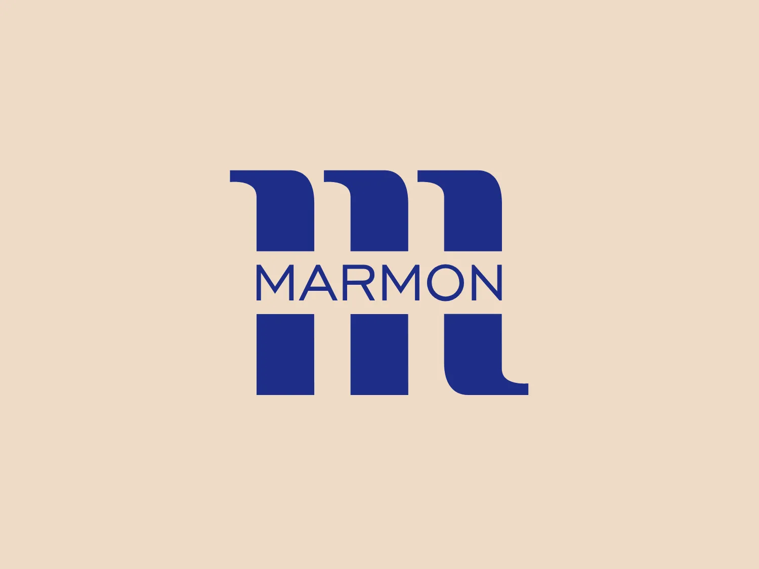 The Marmon logo features a bold, uppercase typography with three solid, vertical bars stylized to create depth, with the first and third bars designed to look as if they have been folded at the upper right corner. The second bar stands uniformly. The name "MARMON" is written below these shapes in a clean, sans-serif font. The monochromatic logo uses a shade of deep blue, suggesting modernity and strength, with a subtle hint of dynamic change suggested by the folded corners.