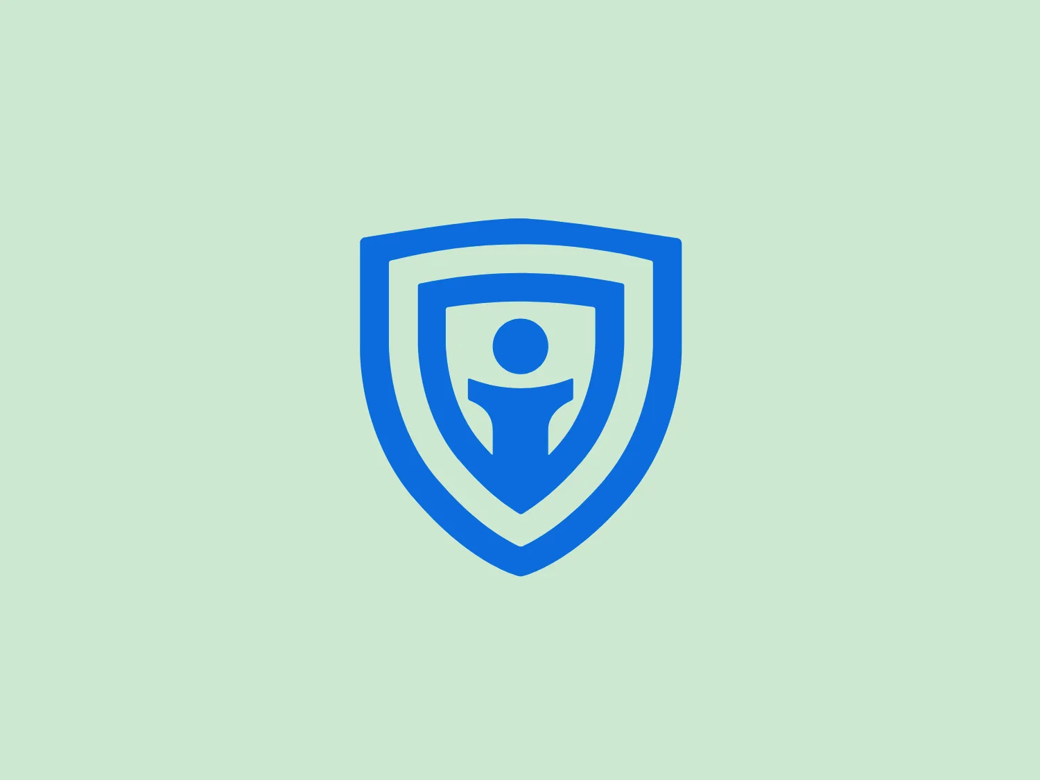 The logo for iThemes Security is a stylized shield emblem with a human figure at the center. The shield is outlined, creating a double-layer effect with the inner shape mirroring the outer one. The human figure is abstract, with arms raised to form a V-shape that also resembles a laurel wreath motif—a common symbol of victory or achievement. The figure's legs are merged with the shield's point, giving a solid and anchored look. The entire logo comprises different shades of blue—a color often associated with trust, security, and professionalism. The design aesthetic is sleek, modern, and conveys a message of protection, unity, and integrity.