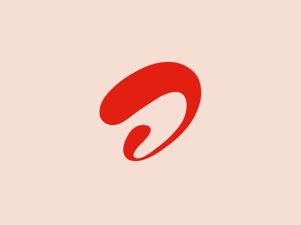 The Airtel logo showcases an abstract design with a dynamic and fluid shape, exuding a sense of motion and transformation. It boldly presents a modern and minimalist aesthetic with its striking red color and clean lines, suggesting innovation and a forward-thinking brand identity. The shape, resembling a swirl or a stylized letter, is crafted to be distinct and memorable.