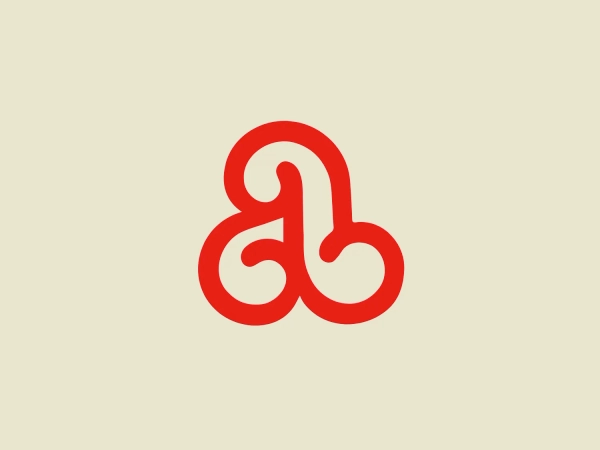 The business logo for Ajinomoto features a bold and fluid design in a strong, vibrant shade of red. The continuous line creates an abstract, interconnected shape with smooth curves and loops, conveying a sense of harmony and balance. The minimalist, modern aesthetic suggests a clean and sophisticated brand identity, making it stand out well against a neutral background.