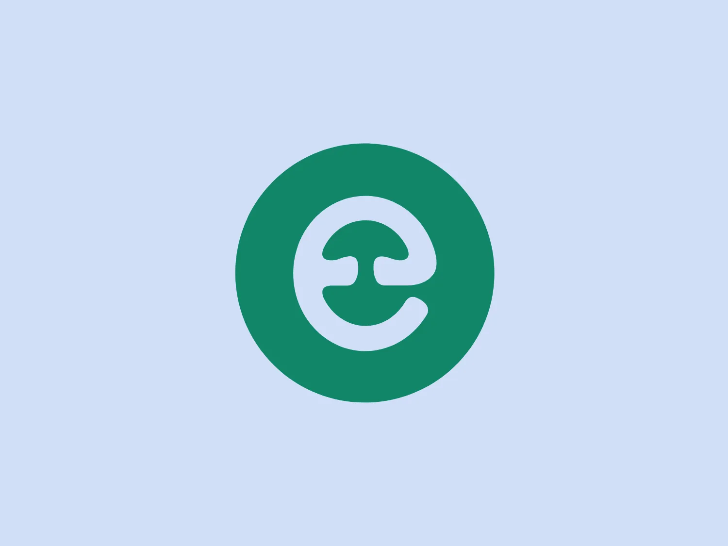 The image depicts a simple and modern logo consisting of a rounded emblem with a stylized, abstract design that resembles both the letter "E" and a circular swirl or knot. The design is created by the negative space in white set against a solid and vibrant teal background. The use of negative space gives it a clean and contemporary appearance, with an approachable and dynamic feel. The circular shape suggests inclusivity or community, while the unique "E" formation adds brand uniqueness. The Logo for Ecovative Design.