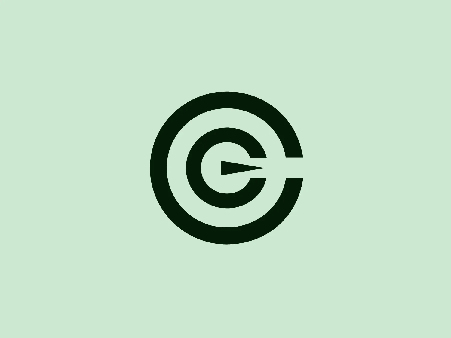 The Carmignac logo is a modern and clean design featuring bold, dark green concentric circles. The stylized letter 'G' within the smallest circle looks like an arrow pointing to the right, suggesting movement or progress. The seamless integration of the arrow breaking the circle boundary signifies forward motion or direction. The use of green aligns with growth, freshness, and eco-friendliness, possibly reflecting the brand's values or industry. Its simplicity makes it a versatile and easily recognizable design.
