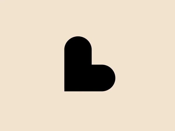 What we like about the Landmark Shops logo is its minimalist, modern heart-shaped design and bold black color that gives it a clean and distinctive look.