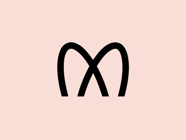 The MIDI Association logo features a bold and stylized design with two arches that converge to form an abstract "M" shape. The symmetrical arches create a sense of balance and stability, resulting in a simplistic and modern design with clean lines and no additional embellishments. The black logo stands out well against lighter backgrounds and has a strong visual presence due to its thick lines and distinct negative space that forms the "M." The minimalistic aesthetic ensures broad versatility for various applications.
