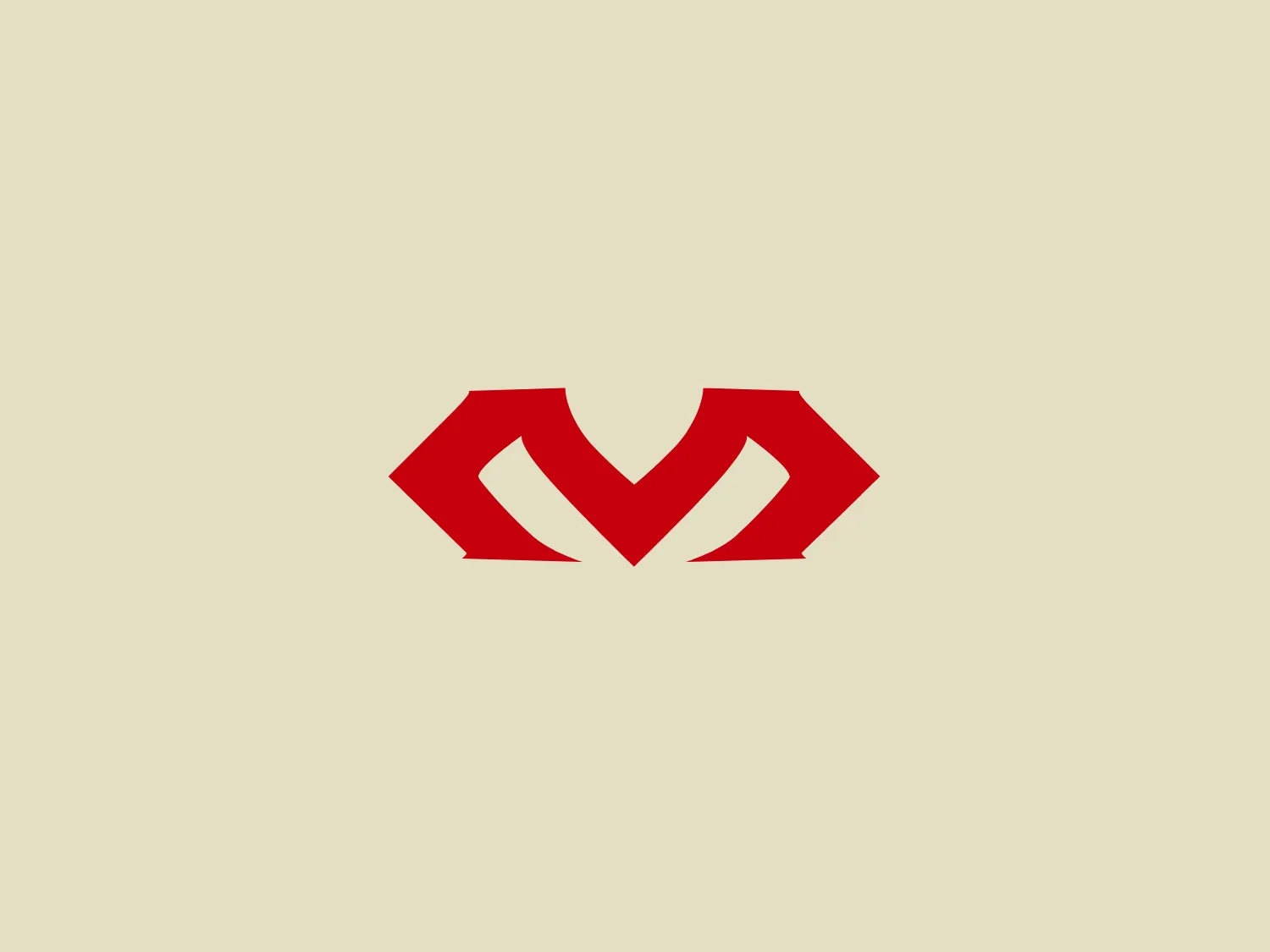 The McDavid logo features a bold, geometric design made of two symmetrical red shapes resembling chevrons or arrows pointing outward. The shapes combine to form a stylized "M" or a bird in flight, with the negative space creating a distinct "V" in the center. The color is a solid, vibrant red, which gives the logo an energetic and powerful feel. The design is simple, yet impactful, with clean lines, sharp angles, and a sense of movement or progress.