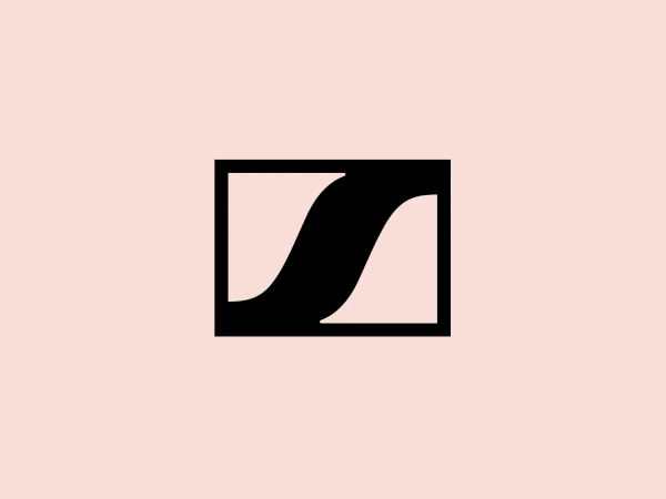 The Sennheiser logo features a bold, abstract design consisting of a black square frame containing a dynamic white element that resembles a stylized, italic letter "N" or a twisted ribbon. The simplicity of the form, using only black and white, creates a striking contrast and a modern, minimalistic aesthetic that could easily be associated with a variety of brands or industries. The clean lines and sharp angles contribute to a sleek and professional look.
