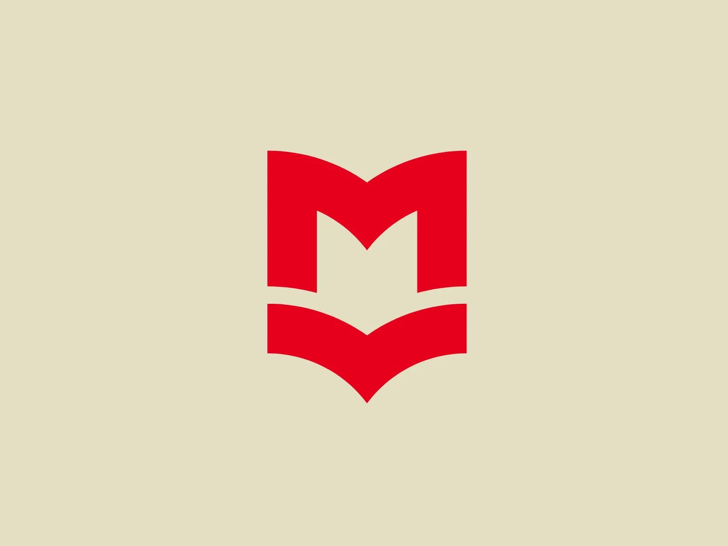 The Marcelle Mallet logo is a modern and minimalist stylized letter "M" composed of geometric shapes. It features two bold red peaks that suggest angular wings or pages of a book, with a negative space in the middle that forms a white "M" against the red background. The design focuses on symmetry and the use of negative space to create the letterform, resulting in a strong and dynamic feel likely representing strength, movement, or a progressive brand identity.