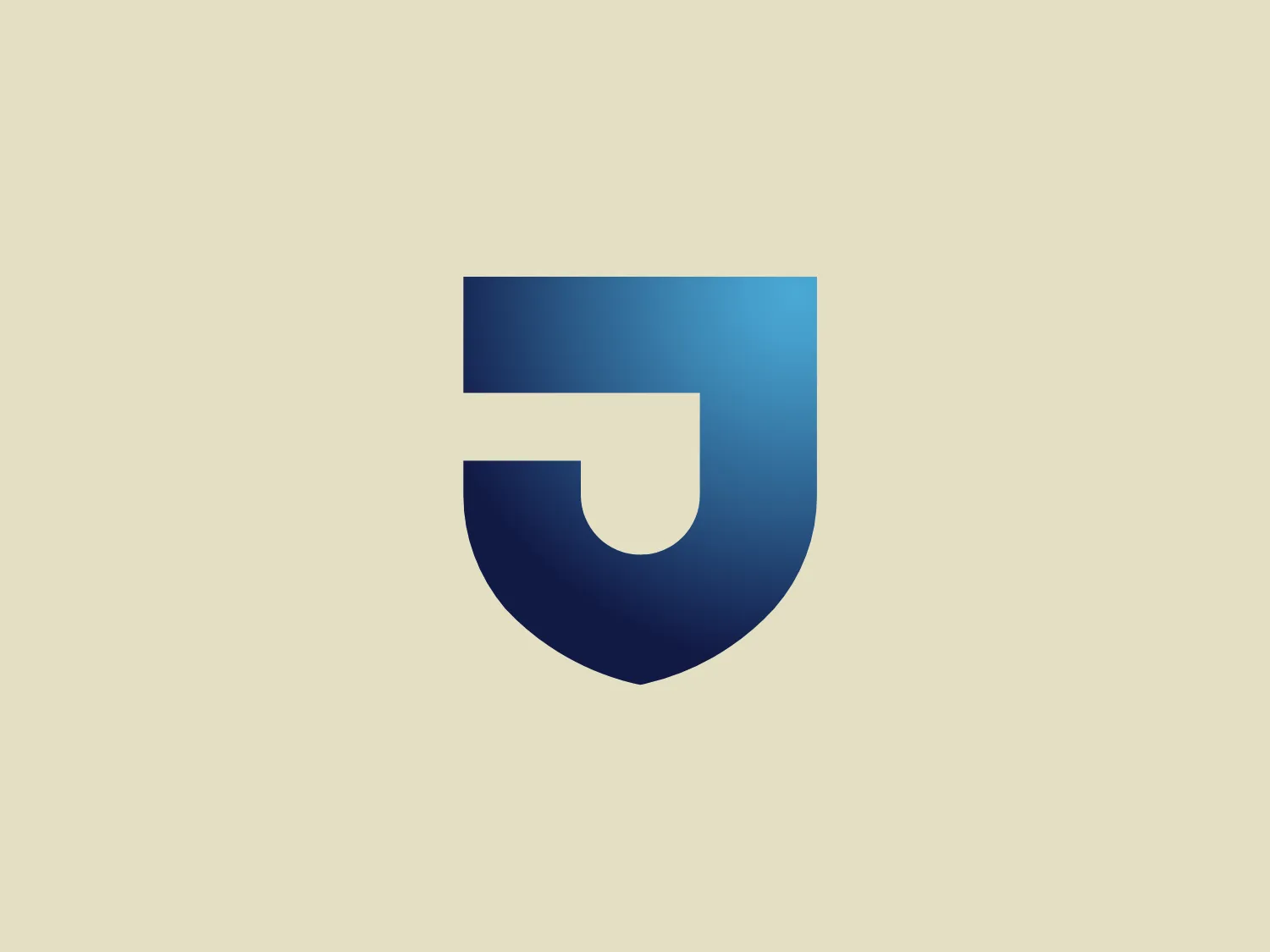 The Thomas Jefferson University logo showcases a modern and minimalist design aesthetic with a shield-like shape dominated by shades of blue. The negative space in the shape of the letter 'J' creates a distinctive character. The gradient effect starts with deep navy blue at the top and transitions to a lighter shade at the bottom, adding depth and dimension. The overall logo has a sleek and professional look, evoking a sense of security, reliability, and protection associated with shield imagery.