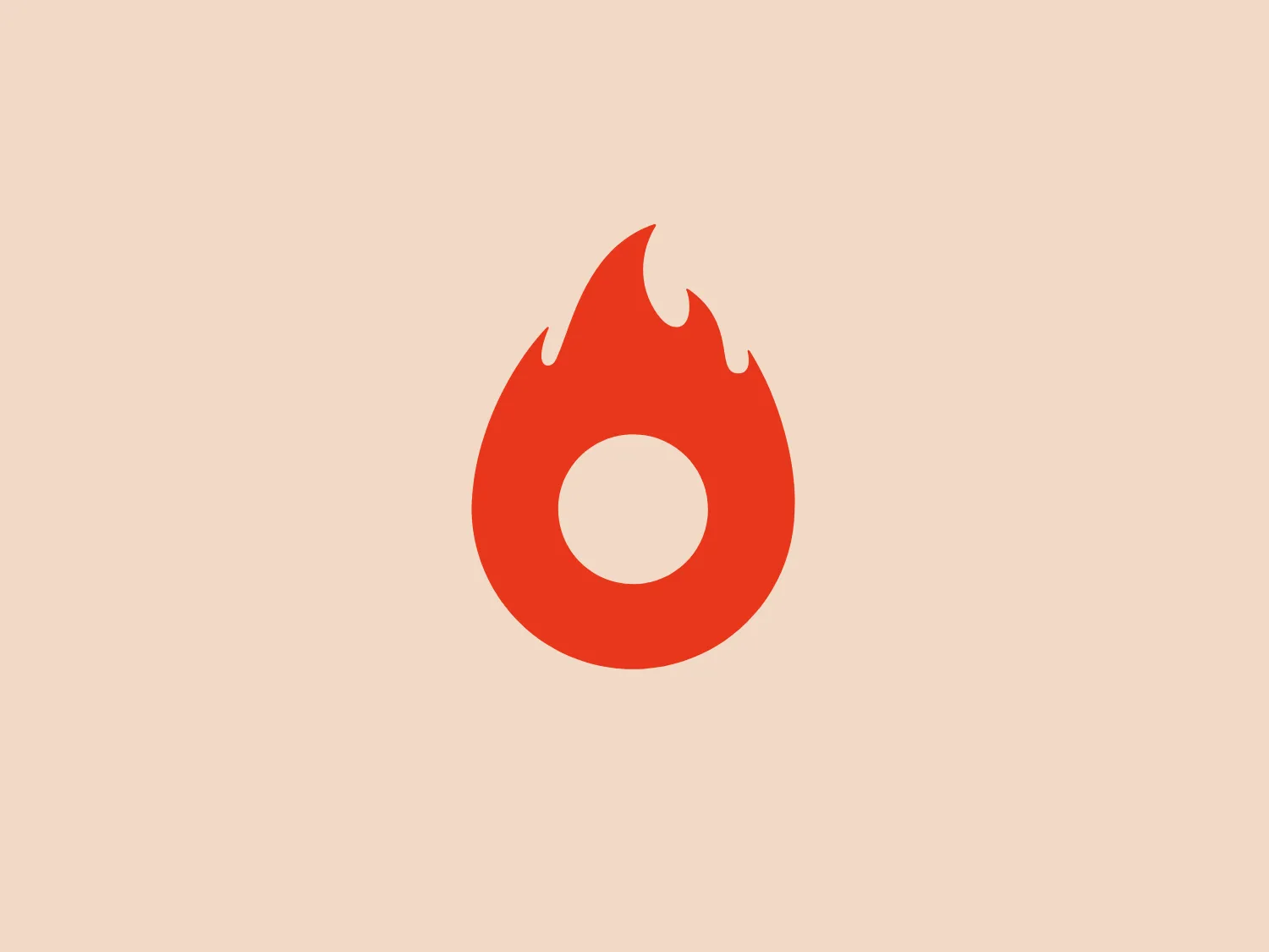 The logo features a stylized flame with a modern, minimalist design. The main body of the flame is a bright, solid red-orange color, evocative of heat and energy. The flame has smooth, curved lines creating the iconic teardrop shape of a fire motif, with pointed tips at the top that suggest a flickering movement. Within the flame silhouette is a white, circular cutout at the center, providing an effective contrast and drawing the eye to the middle of the design. This negative space could be interpreted as the source of the flame or an eye, adding a layer of symbolism to the logo.