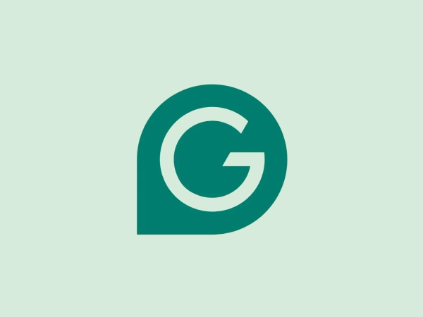 The logo features a stylized letter "G" in white on a rich, dark green background. The design of the "G" is modern and bold, with a geometric cut that gives the impression of motion or a loop. The "G" is encased within a darker green rounded shape that resembles a chat bubble or a thought bubble, reinforcing the idea of communication, guidance, or a tech-oriented brand. The color contrast is stark, providing a clean and professional look. The simplicity of the design lends itself to versatility across various applications.