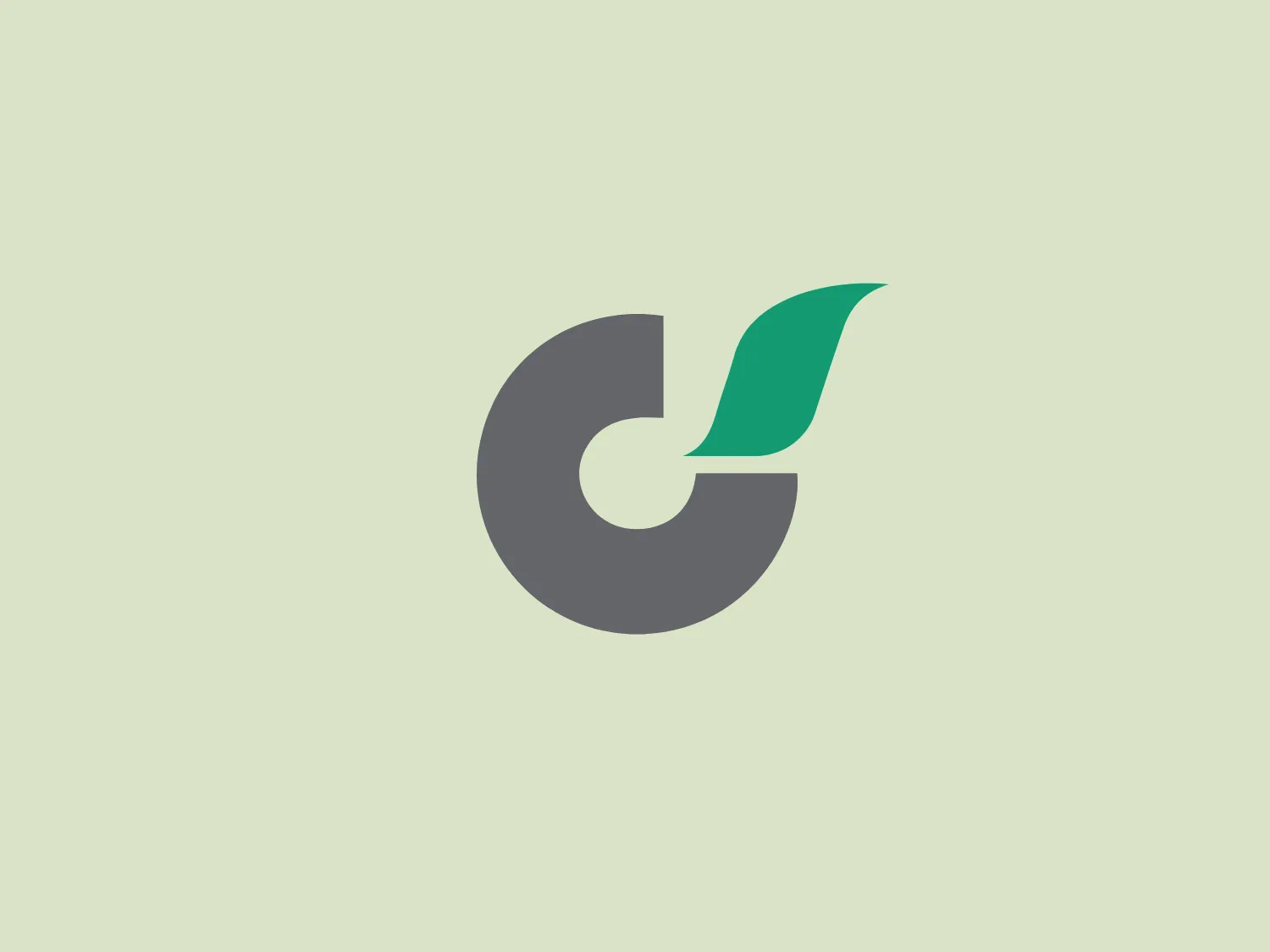 The Gas Malaysia logo features a stylized, modern design composed of two distinct elements. The larger part is a circular shape with a clean cut, suggesting an abstract representation of a letter or a dynamic symbol. This circular element is rendered in a gradient of grays, adding depth and dimension. Emerging from the circular form is a leaf-like shape with a pointed tip, adding an organic touch to the design. This element is colored in a vibrant shade of green, providing a pop of color that contrasts strikingly with the gray. The overall aesthetic is sleek, professional, and suggests themes of growth, renewal, or eco-friendliness.