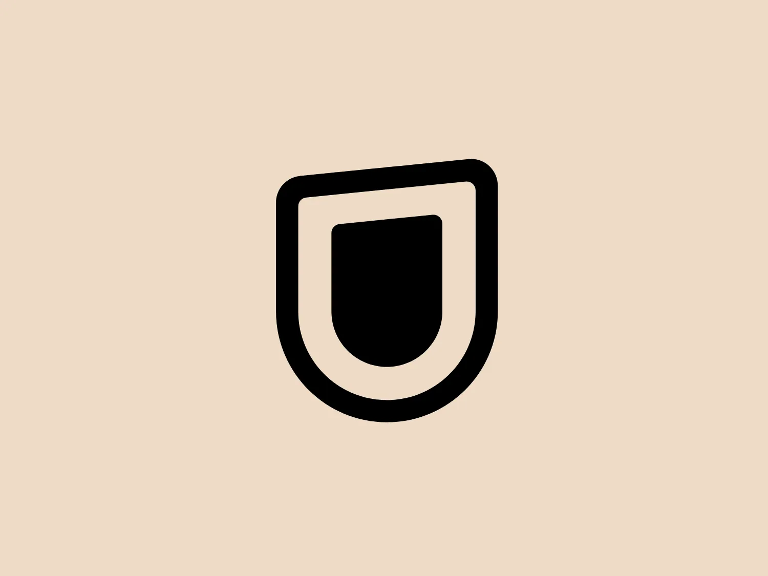 The U-Next logo boasts a simple yet bold design with a shield-like shape. Its solid black color creates a stark contrast that stands out well against a lighter background. The clean lines and symmetrical silhouette hint at stability and protection. This modern, minimalistic design is strong and straightforward.